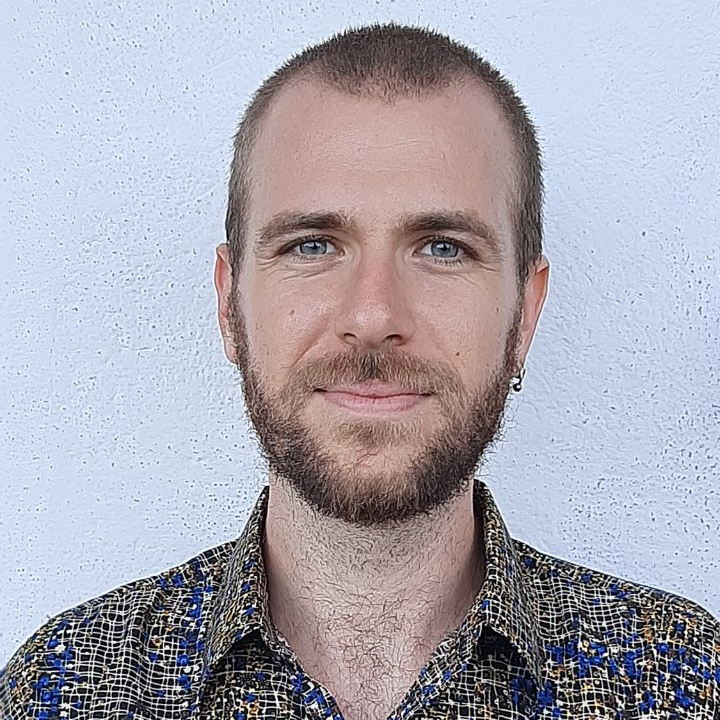 Picture of Javier Selva. Caucasian male wearing a shirt, with short hair and a slight smile, on a white background.